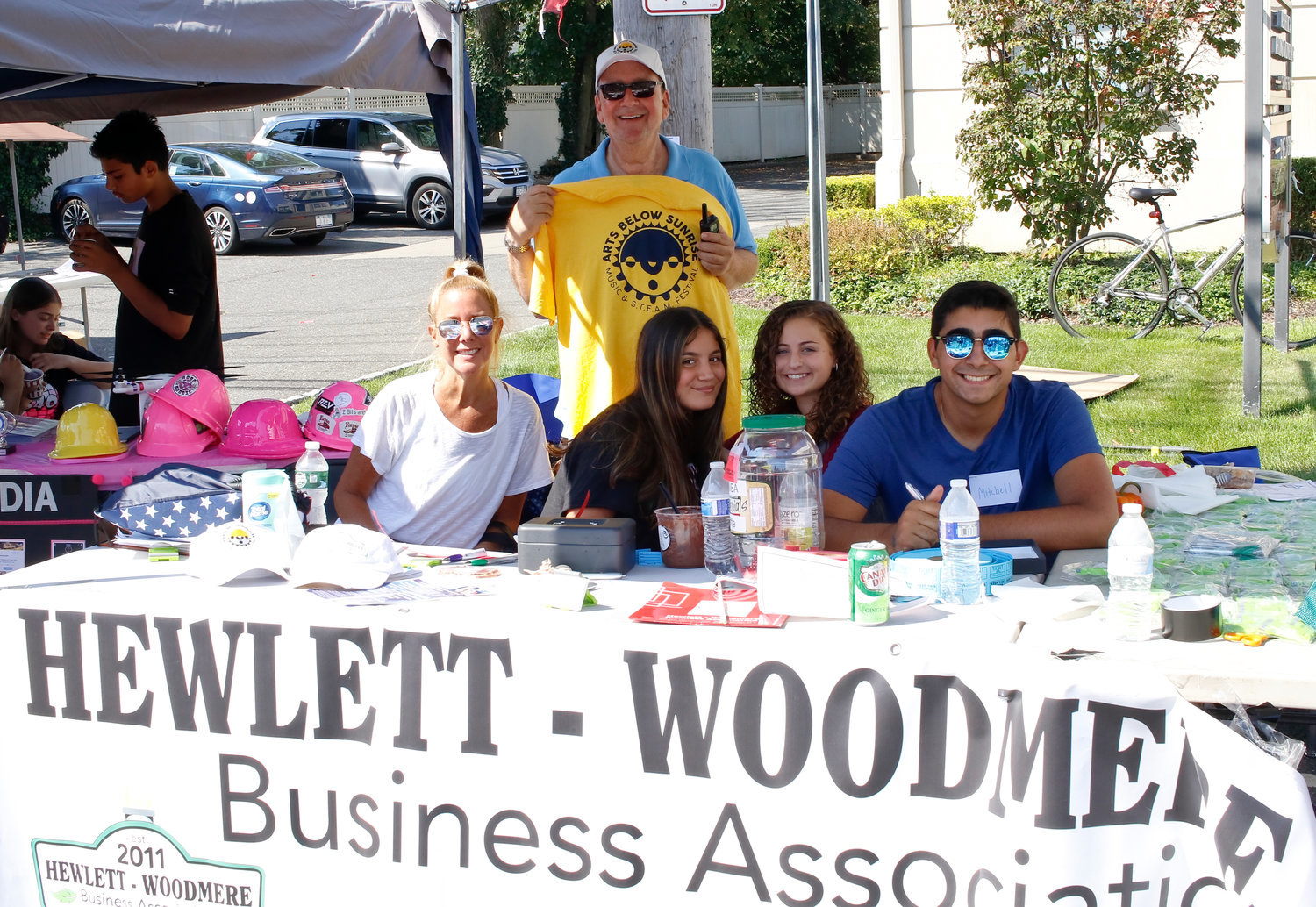 In 2019, the Hewlett Woodmere Business Association table was staffed by from left, Linda Kreisman, David Friedman, Izzy Diglio, Kailey Kshonz and Mitchell Shemtov.