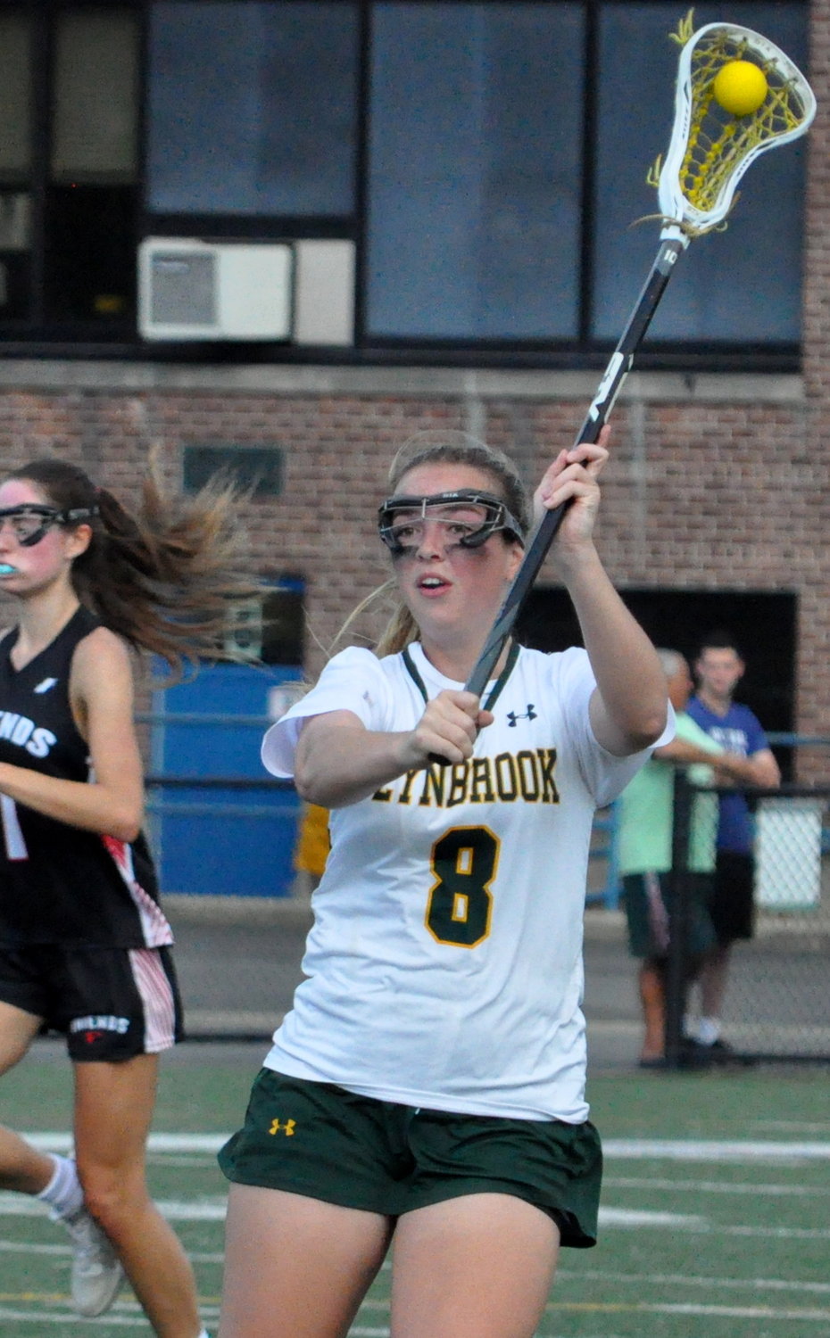Junior Caityblu Cavassa had three assists and dominated draws in Lynbrook's 15-9 playoff victory over Friends Academy.