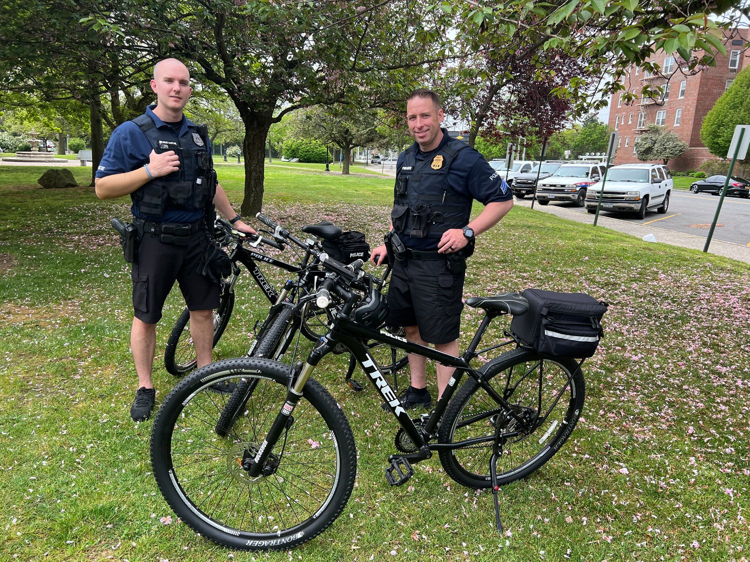 Freeport Police Officer Corey Cooke and Sergeant John Florio regularly zip through the village streets on police bicycles.