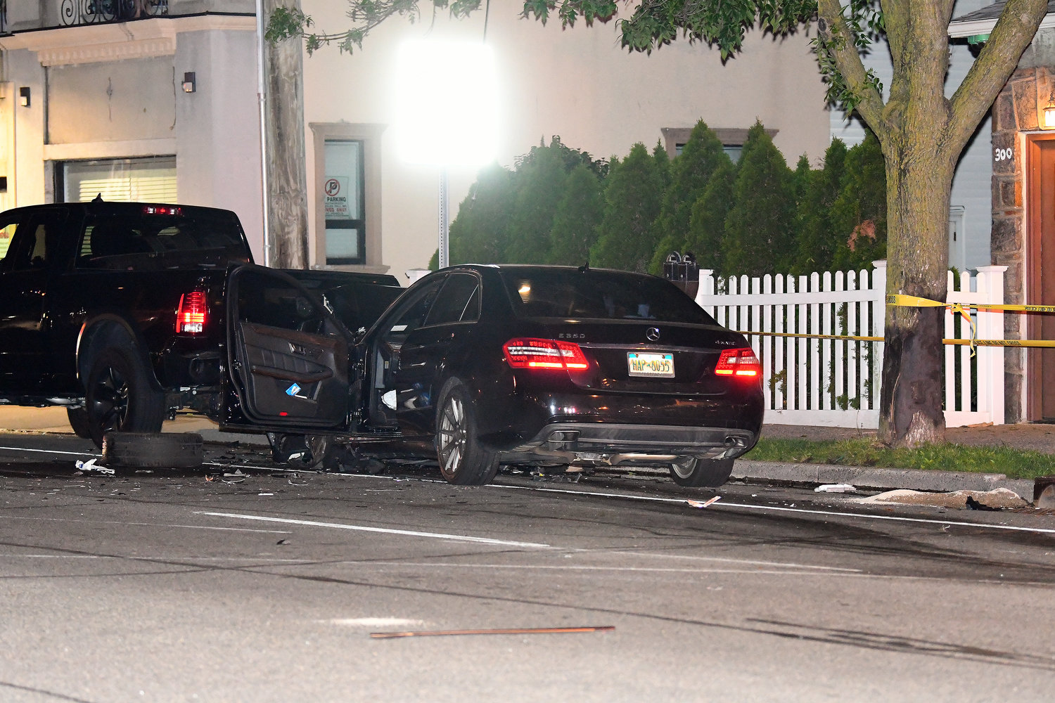The Mercedes Benz continued after striking the Lincoln Town Car and smashed into the back of a parked vehicle.