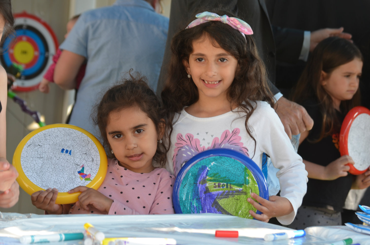 Liana and Abigail Niyazov, ages 5 and 7, had a great time at the barbecue.