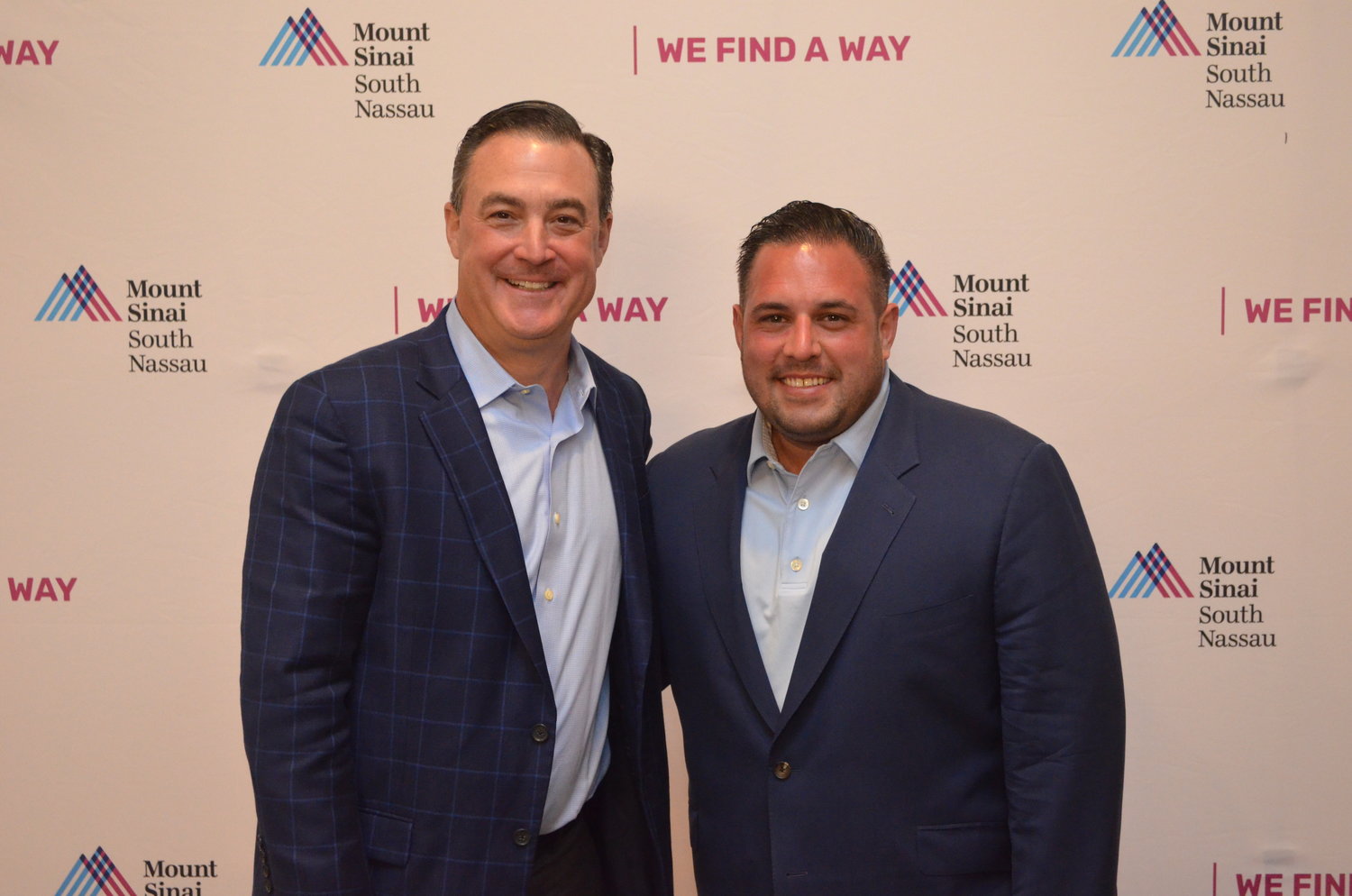 Rockville Centre resident and NFL Deputy General Counsel Larry Ferazani (left) and Town of Hempstead Councilman Anthony D’Esposito (right) were each honored after the 38th annual golf outing and fundraiser on May 16.