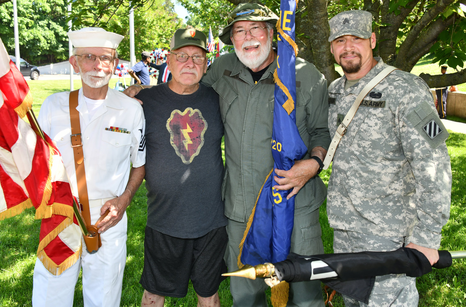 Veterans David Christie, left, Ron Oldenburg Sr., Howard Stillwagon and Don Oldenburg Jr. attended the ceremony.