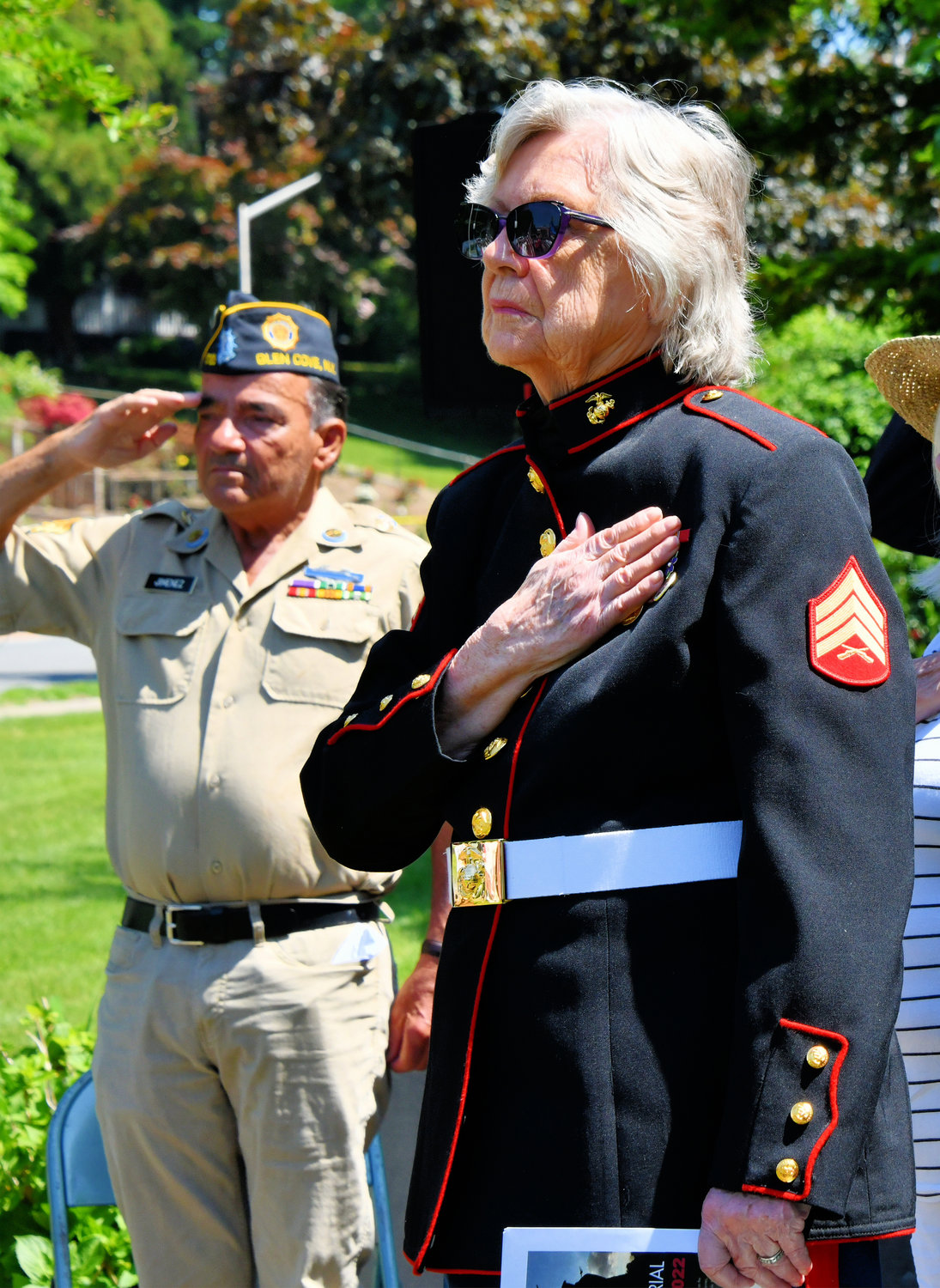 Retired Sgt. Tony Jimenez, left, and retired Sgt. Evelyn Kandel honored the fallen.