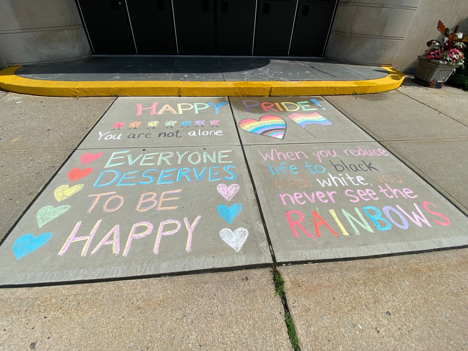 South side High School students created encouraging messages for the LGBTQIA+ community outside the school in recognition of Pride Month.