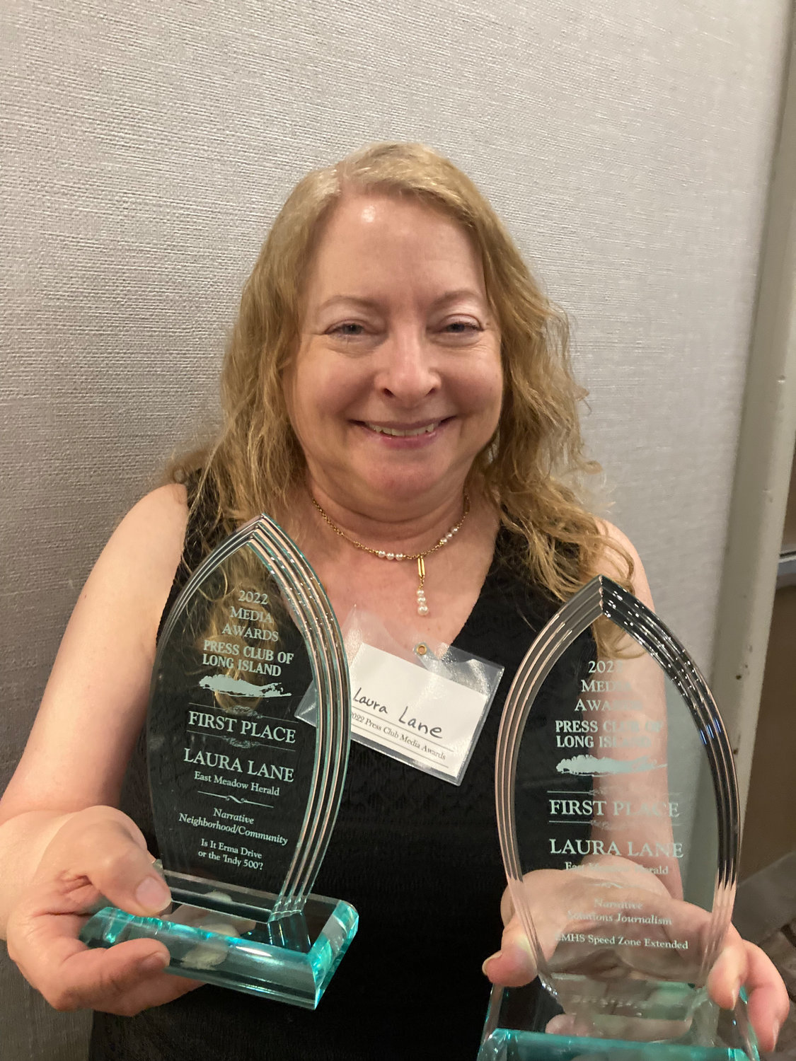 Herald Community Newspapers senior editor Laura Lane won two first place awards during the annual ceremony hosted by the Press Club of Long Island.