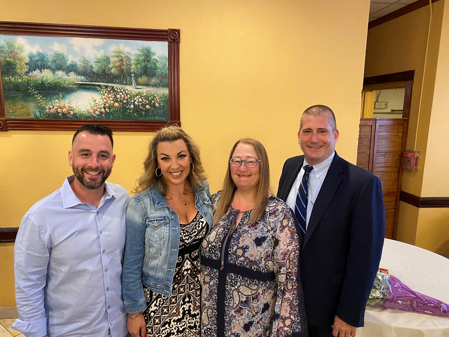 Levittown Superintendent Dr. Tonie McDonald, second from right, taught husband and wife John Gallina, left, and Susanne Gallina. Todd Winch, far right, is succeeding McDonald. The Gallinas, Division Avenue High class of 1998, and have children attending Levittown schools.