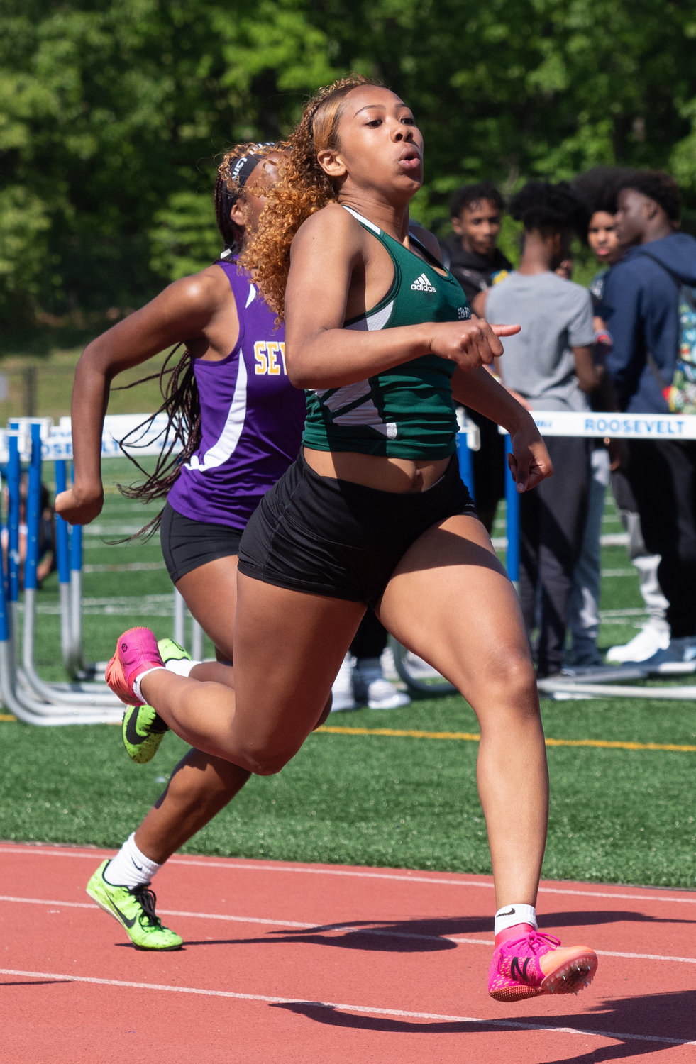 Ariana Paul won the Nassau Class AA titles in the 100m dash and long jump, and totaled 24 points in the county meet.