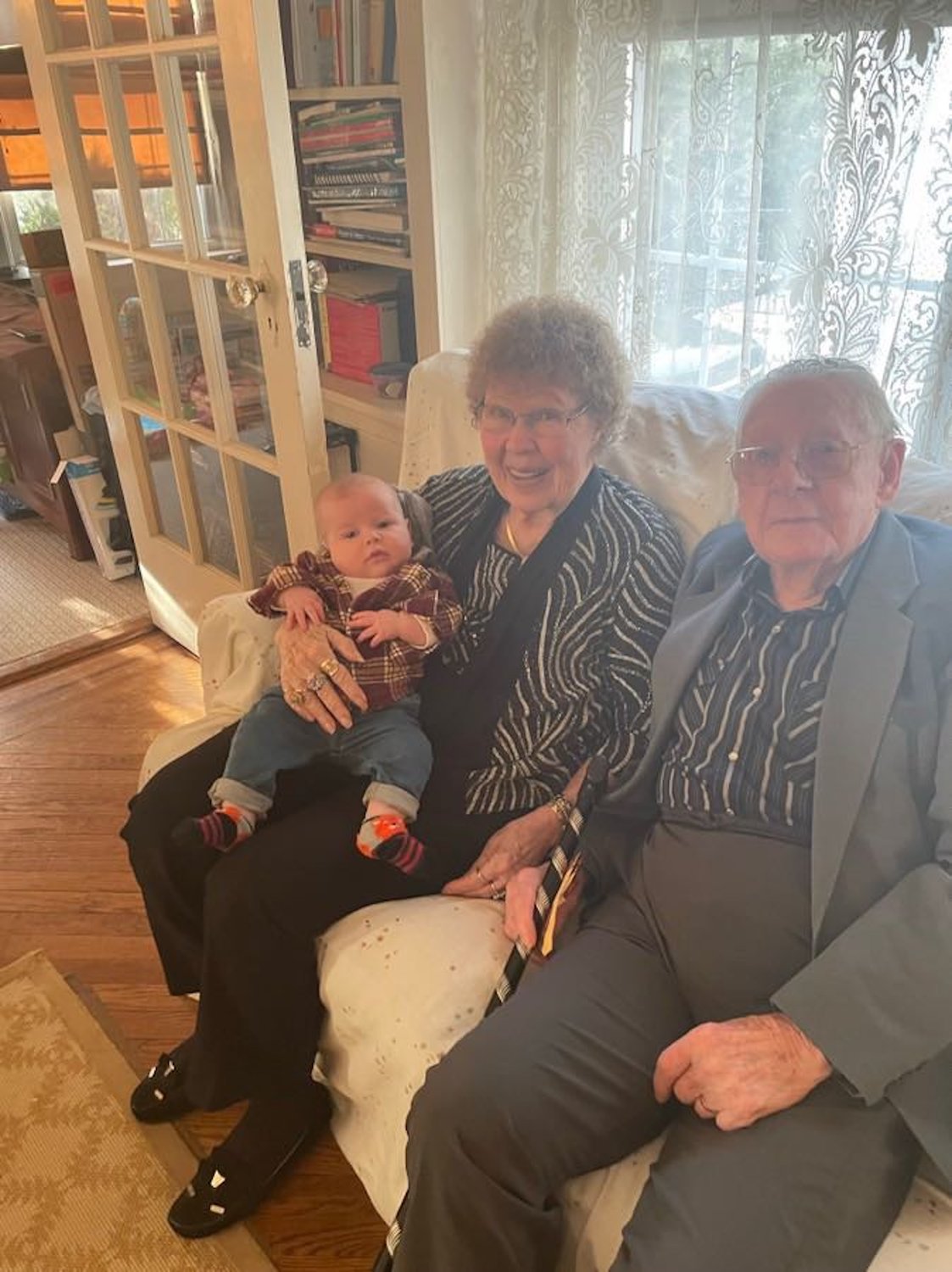 World War II Navy veteran Maurice Mayes, his wife, Norma, and their 5-month-old great-grandson Carter.