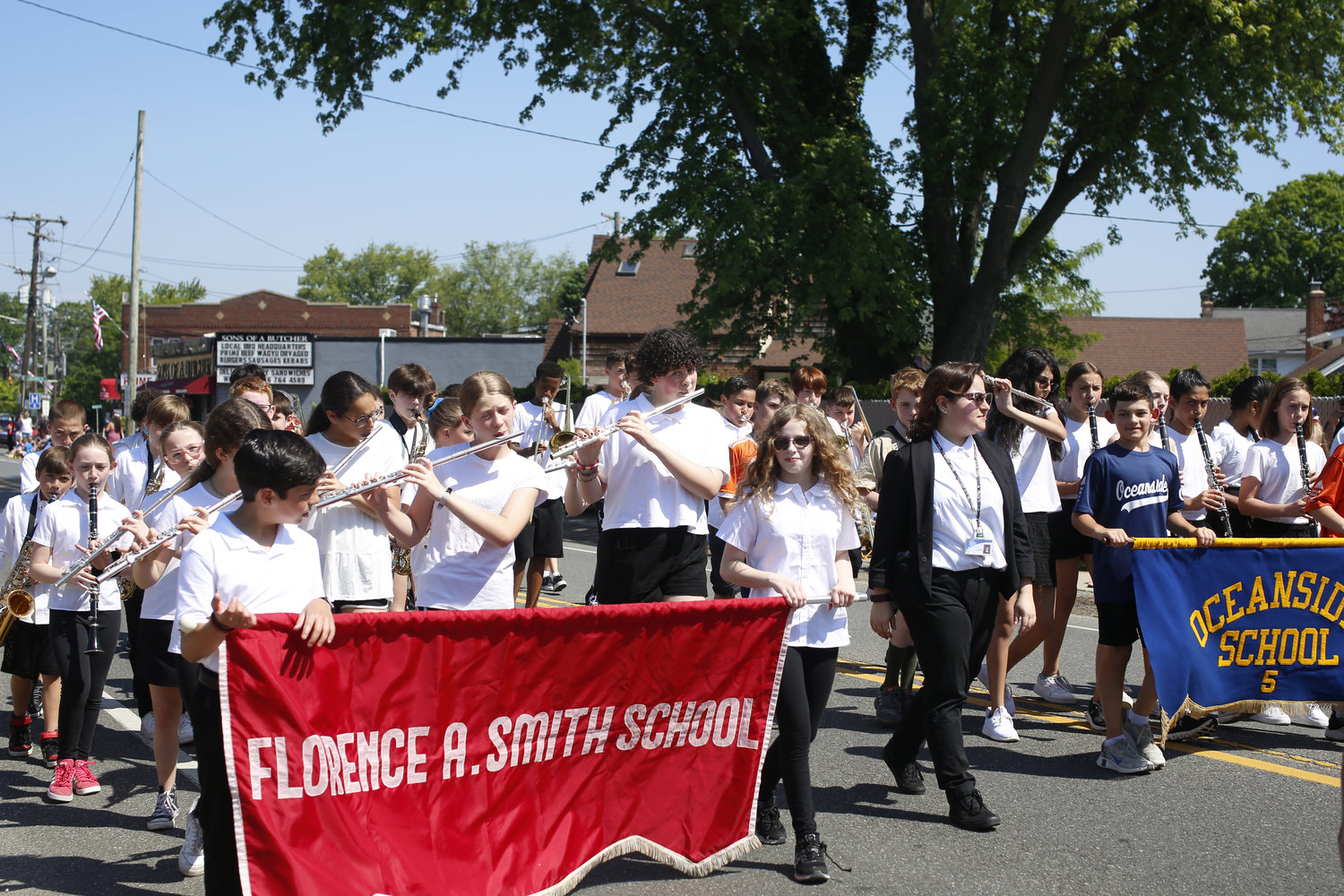 Oceanside School 8 and School 5 Bands marching and playing their instruments in the Oceanside Memorial Day Parade on Monday, May 30th 2022.