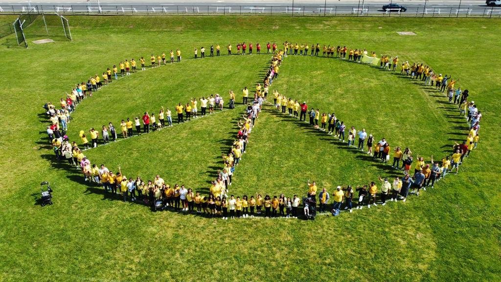 Peace March participants formed a giant peace sign on the Freeport High School sports field. This drone photo was captured by Freeport High graduate Antonio Kelley, who is now a photographer in the office of Dorothy Goosby, the Town of Hempstead’s senior councilwoman and deputy town supervisor.