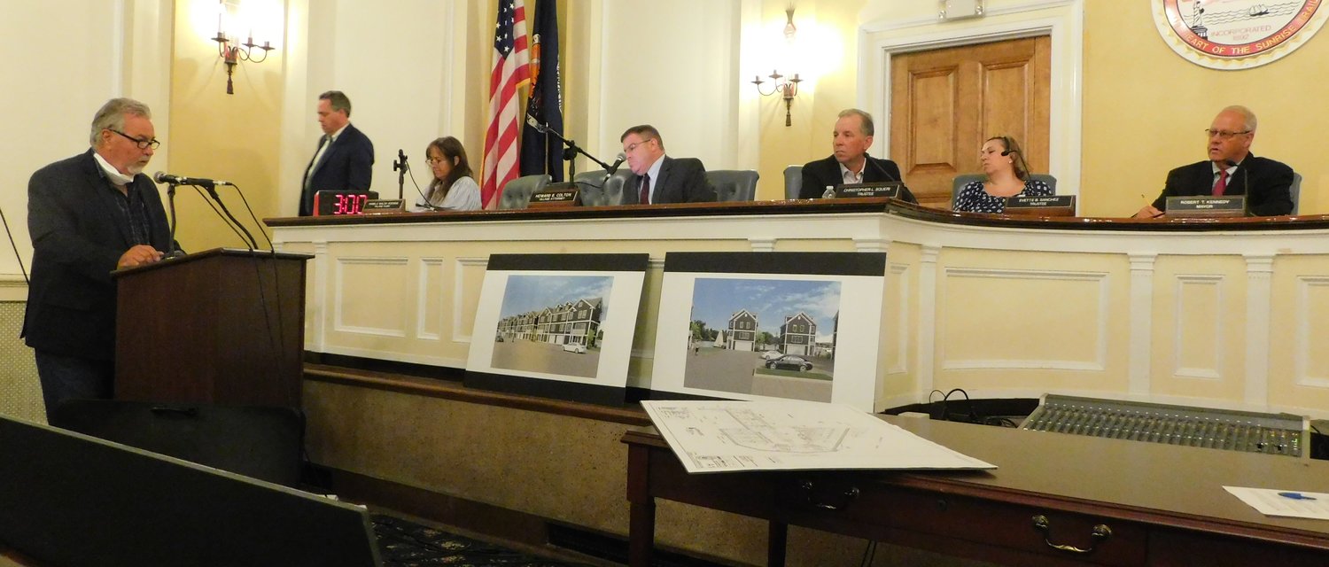 James Prisco, the architect for the proposed 24 condominiums, presented renderings of how the finished buildings would look as well as a site plan and details about parking, walkable spaces, and recreation.