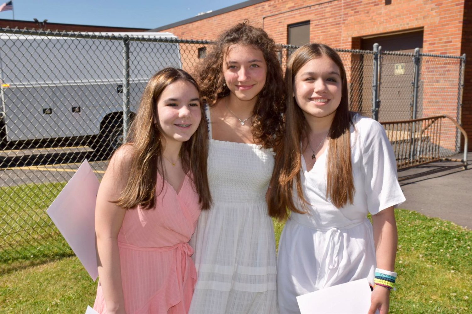 Meaghan Daly, Lauren Elefante and Isabella Clayton at the Grand Avenue Middle School   ceremony.