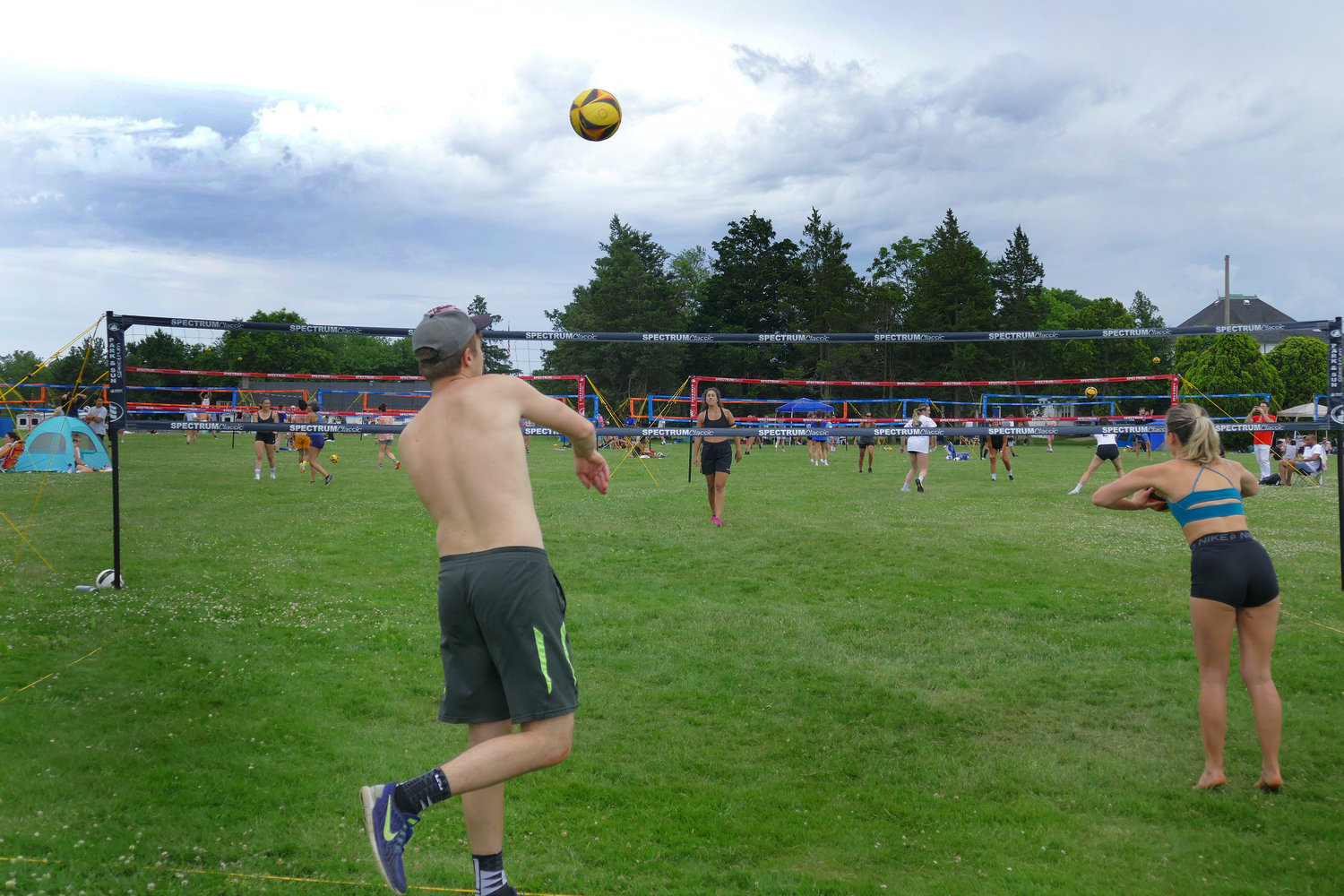 The grass volleyball tournament was an all day event that drew over 150 players.