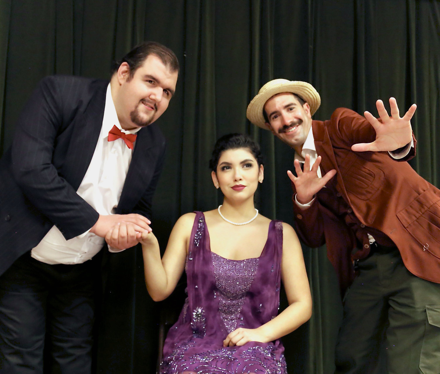 Yum-Yum (Sabrina Lopez) weighs the merits of two suitors, the earnest Nanki-Poo (Richard Risi, left) and the wily Ko-Ko (Michael John Ruggiere), in the Gilbert & Sullivan Light Opera Company of Long Island’s 2022 production of “The Mikado: A Long Island Fantasy.”
