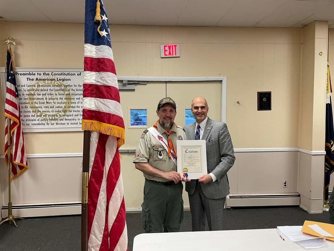 Nassau County Legislator John Giuffre, right, presented Scoutmaster Joseph Canzoneri Jr. with a citation for his years leading Troop 240.