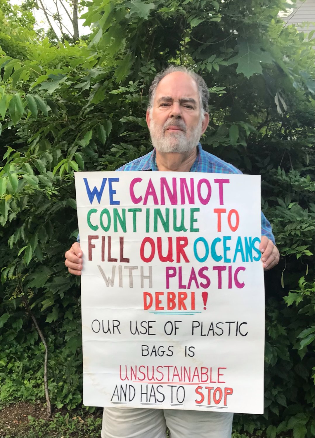 Activist Joseph Varon rallies against the widespread, unsustainable use of plastic packaging.