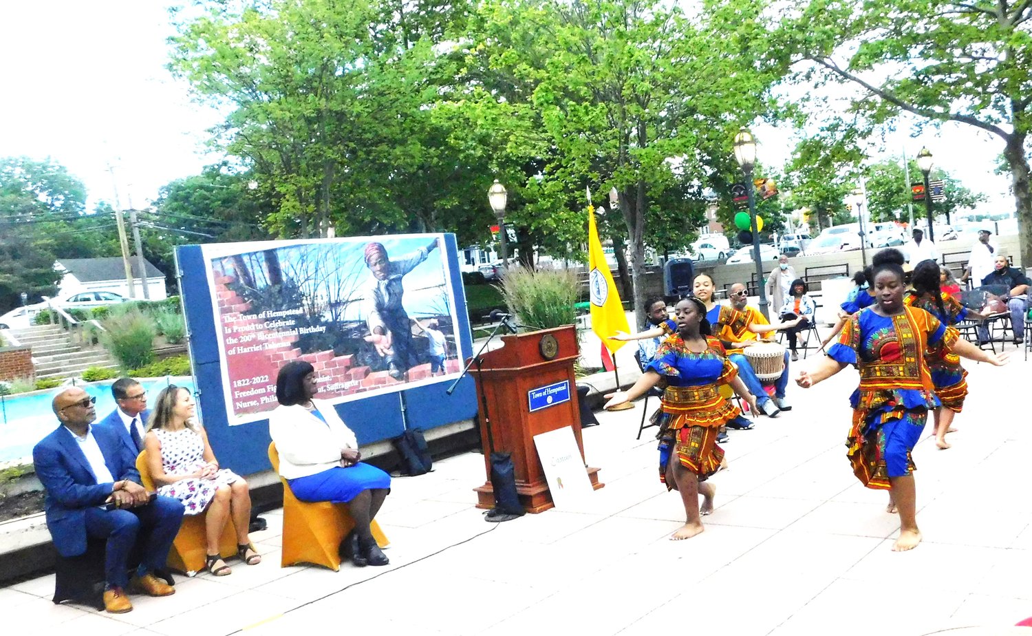 The Long Island Youth Foundation performed African dance at the Town of Hempstead Juneteenth event. Watching were, from left, Lionel Chitty, executive director of Nassau County Minority Affairs; Town Councilman Thomas Muscarella; Receiver of Taxes Jeanine Driscoll; and Deputy Town Supervisor Dorothy L. Goosby.