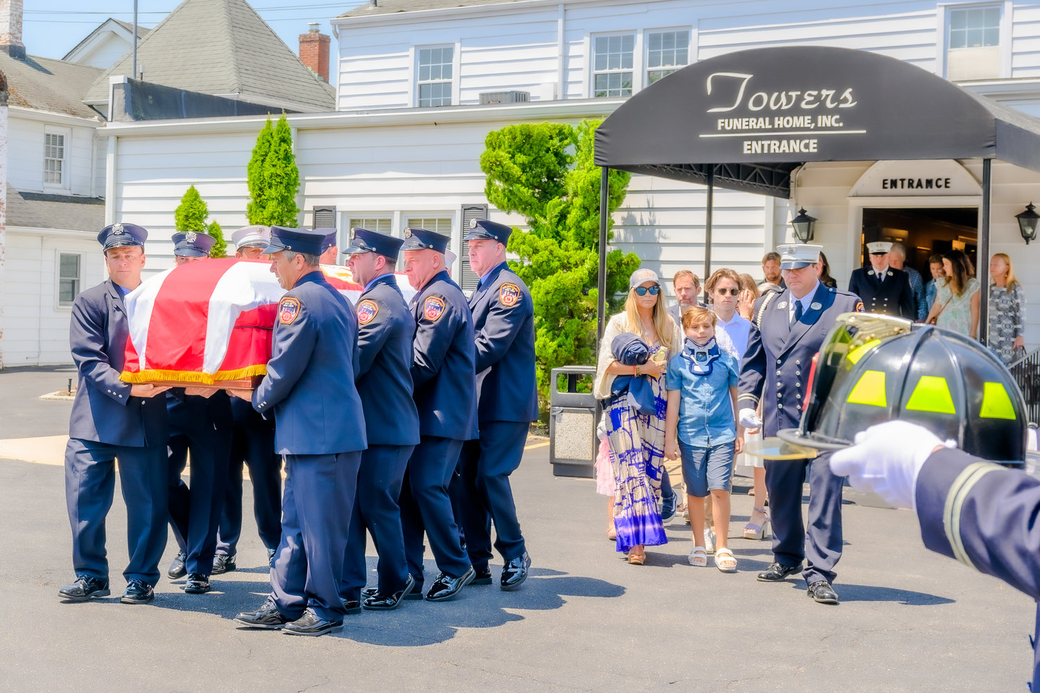 Firefighters of Ladder 137, in Rockaway Beach, carried the casket of Casey Skudin after an hour-long FDNY service at the Towers Funeral Home in Oceanside.