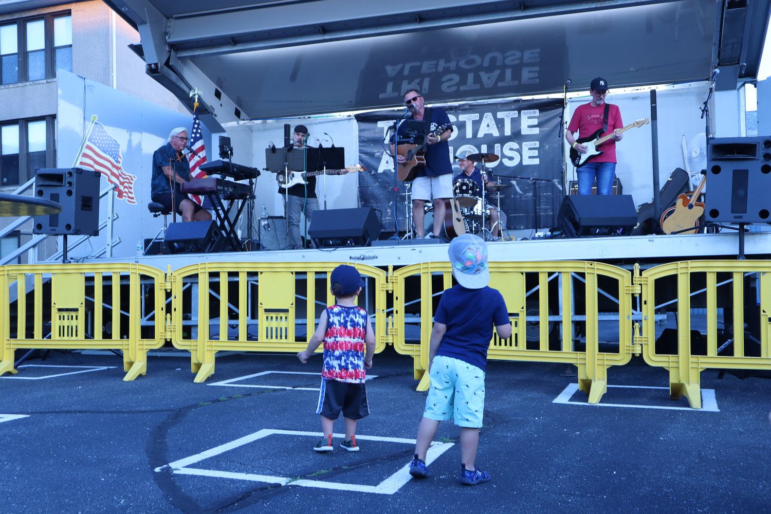 A couple of young attendees dance to the tunes of Tri State Alehouse on Saturday.