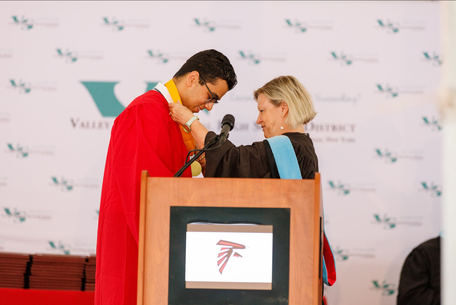 South High valedictorian Sameer Singh received his medal from Principal Maureen Henry.