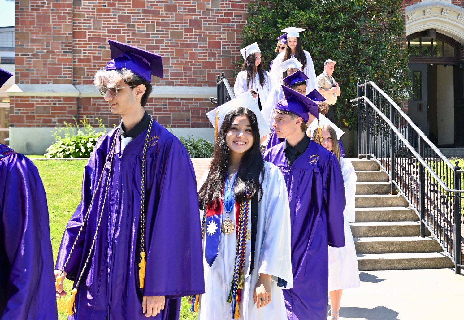 Oyster Bay High School seniors entered the commencement ceremony to “Pomp and Circumstance.”