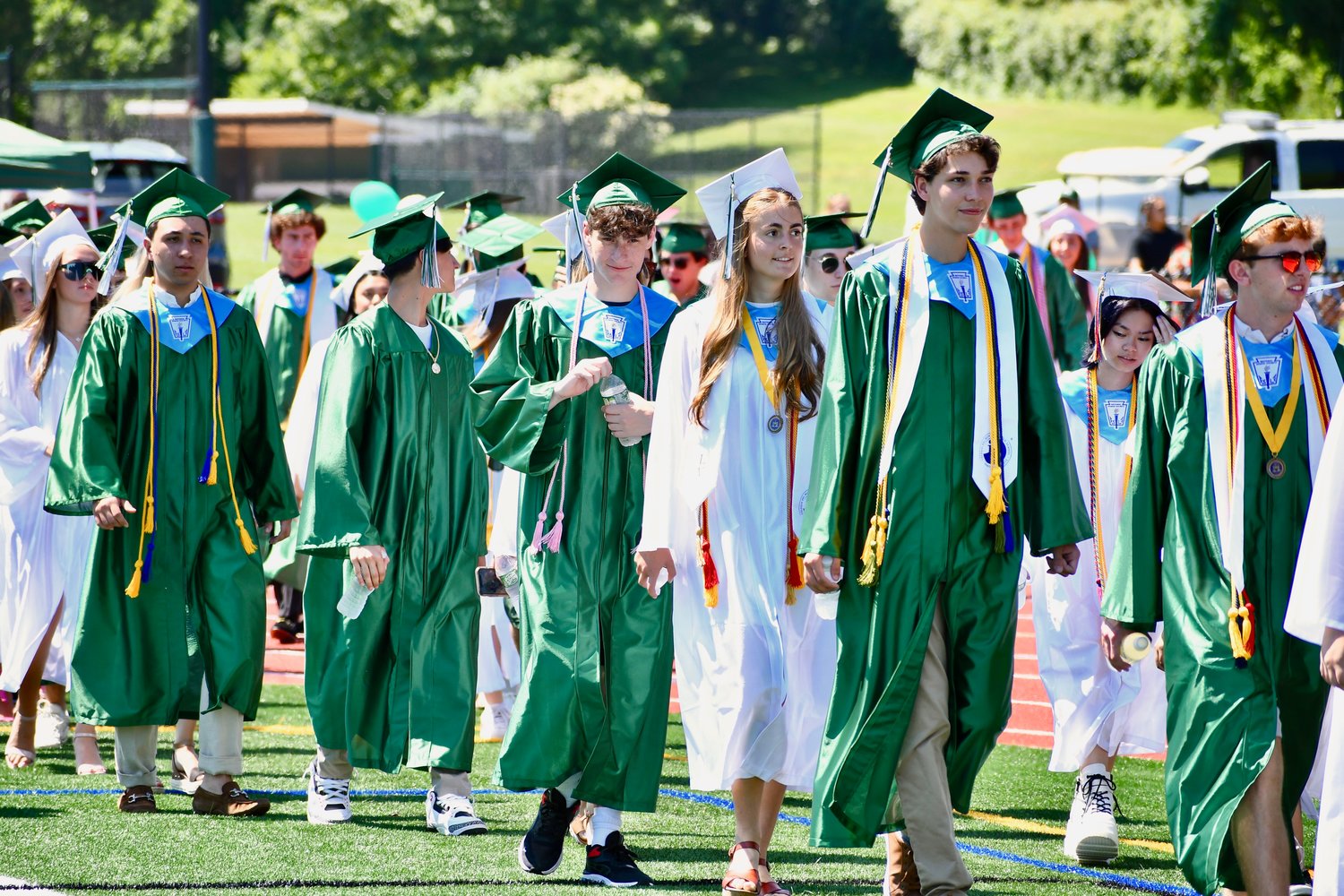 Locust Valley High School graduates entered the commencement ceremony as loved ones cheered.