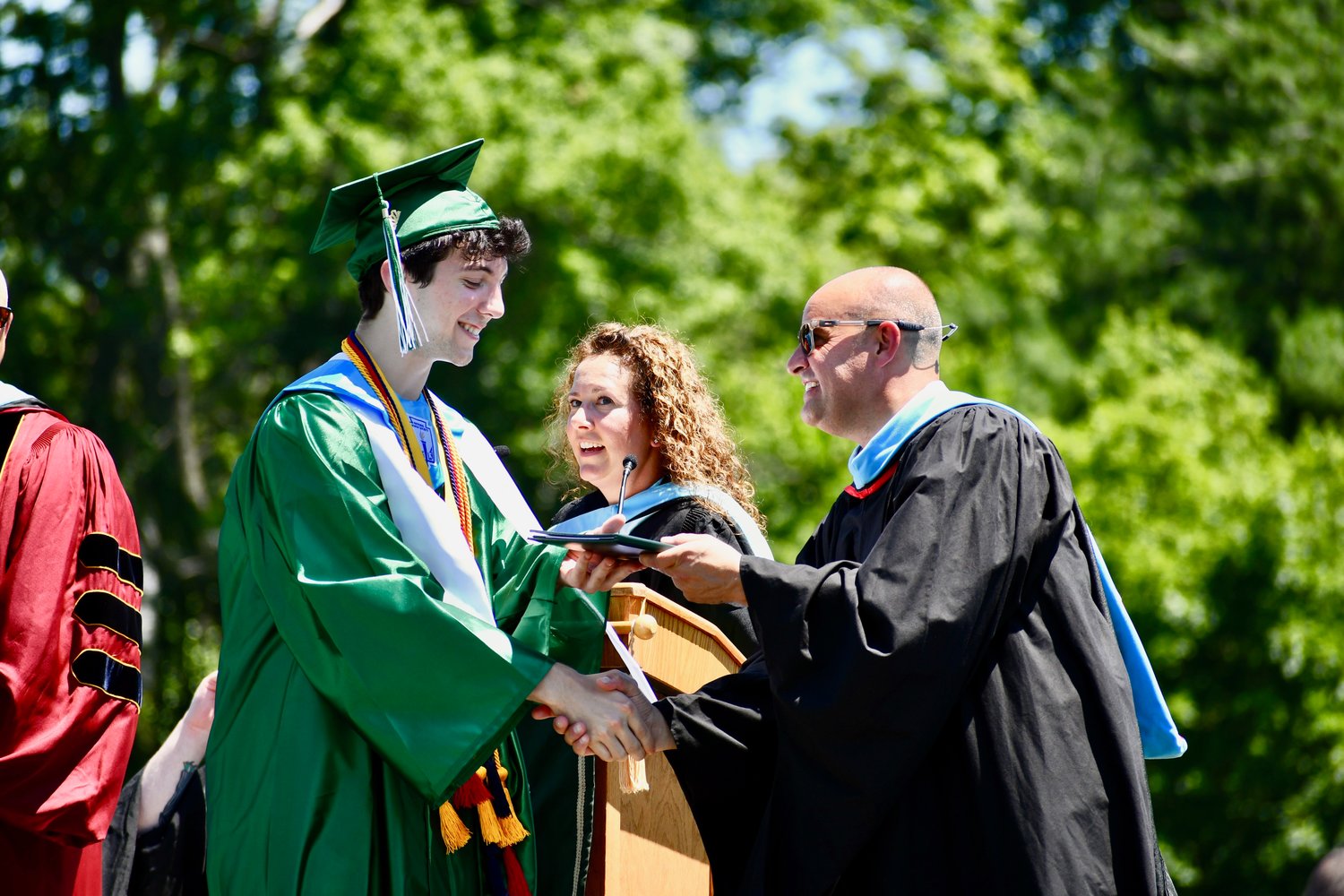 Principal Patrick DiClemente, right, presented diplomas to the graduates.