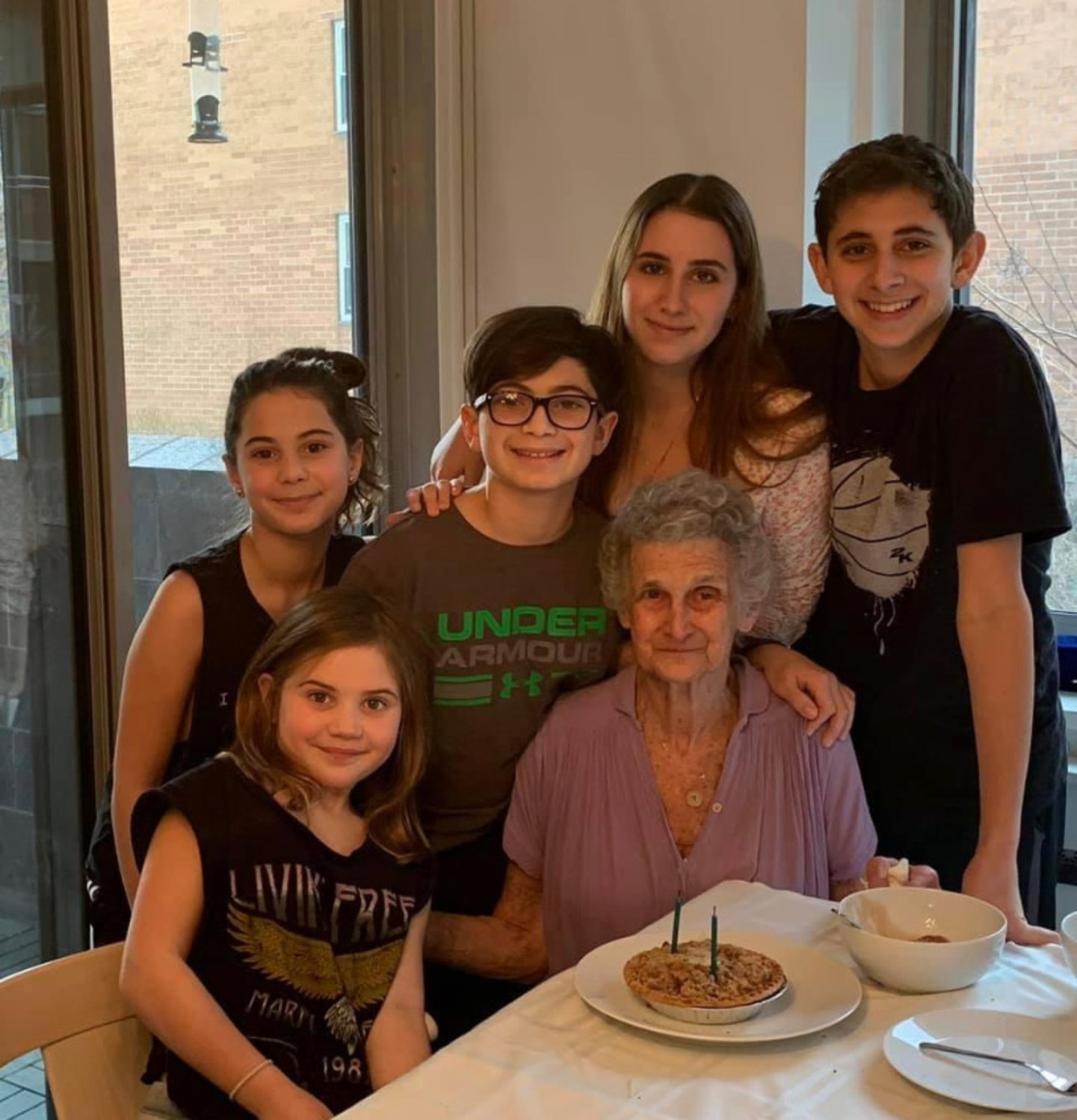 Ellen First, with her grandchildren, clockwise from lower left, Stella, Charley, and Hunter Heumann and Gabrielle and Zachary Miles, celebrated her birthday a few years ago.