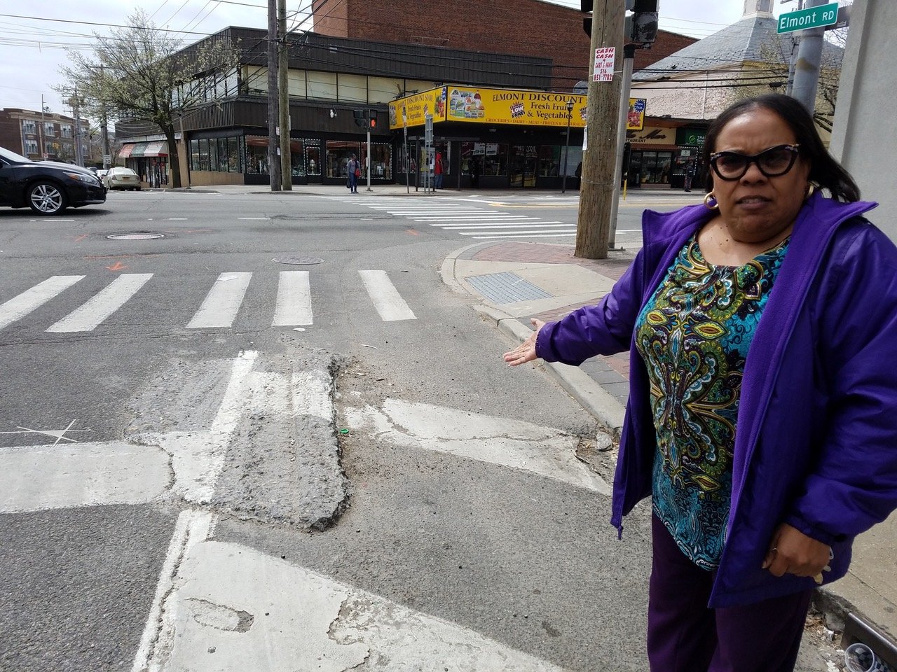 Elmont community leader Claudine Hall said that necessary repairs were neglected on Elmont Road because of the focus on implementing the Shot Spotter program.