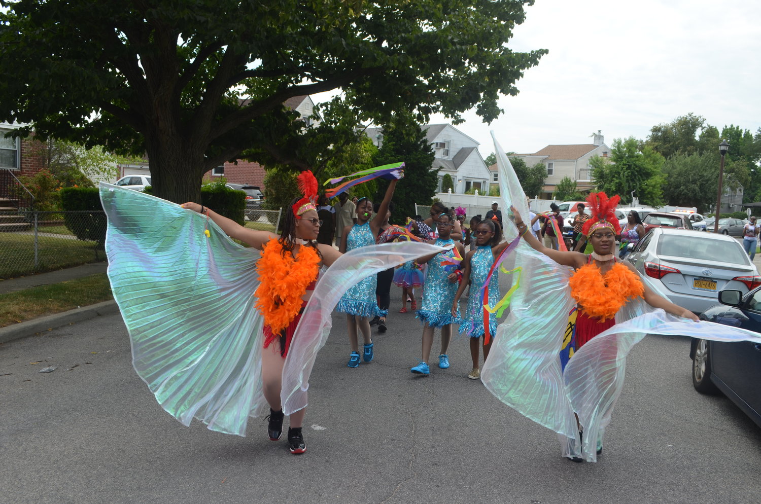 Children ages four to 17 who attend the dance school participated in the parade and festival while wearing costumes from their annual dance recital.