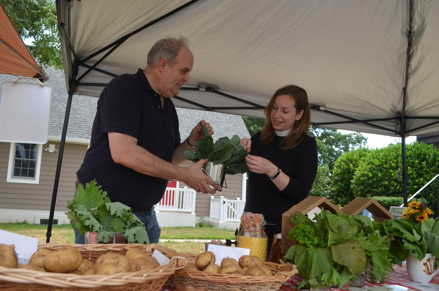 Congregation member and volunteer Carl Bucking took at look at some of the produce.