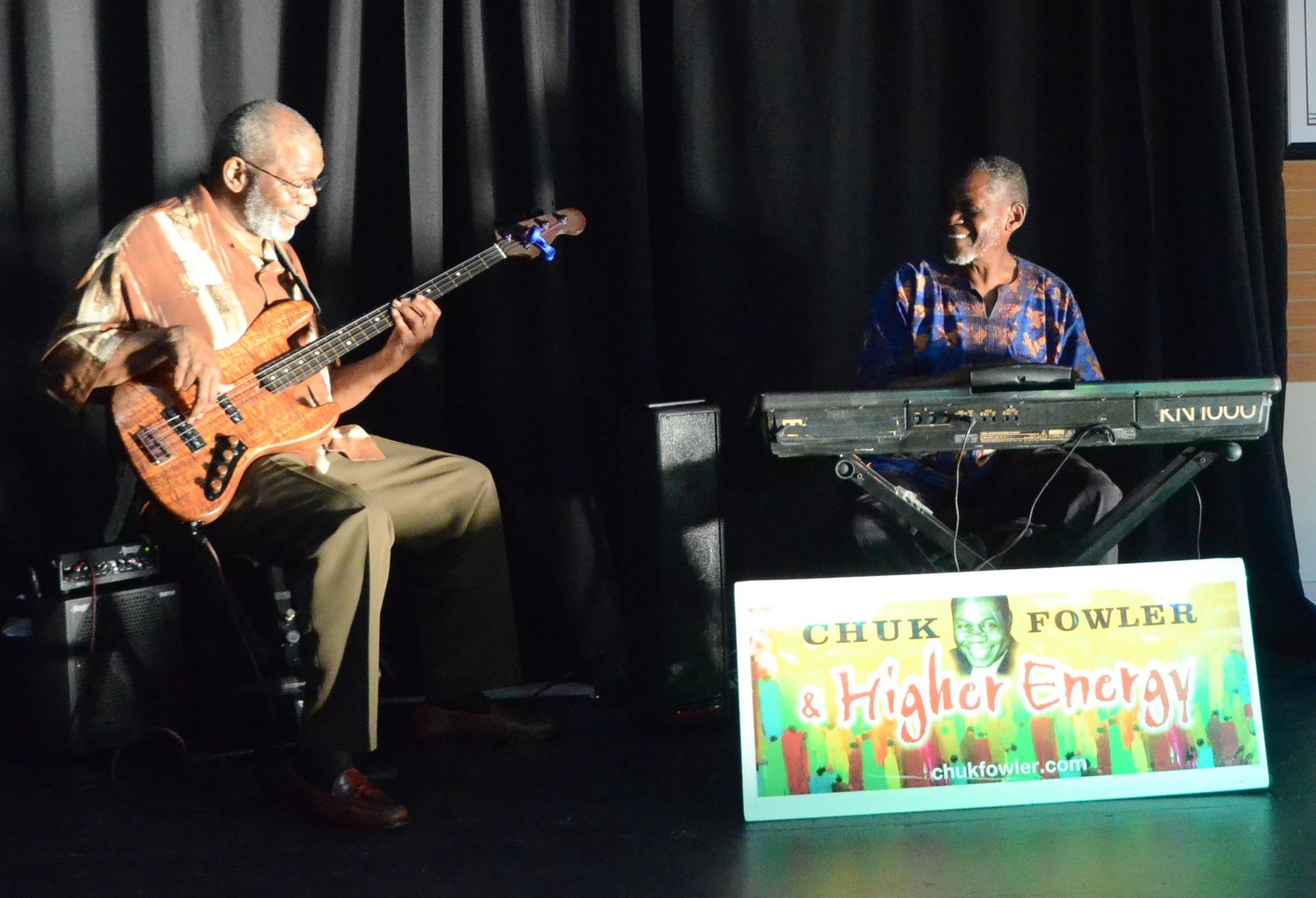 Paul Ramsey, left, and Chuk Fowler drew their audiences into a cloud of welcoming sounds at the Sparkle on Stage Cultural Arts Center, where they perform every Wednesday night.