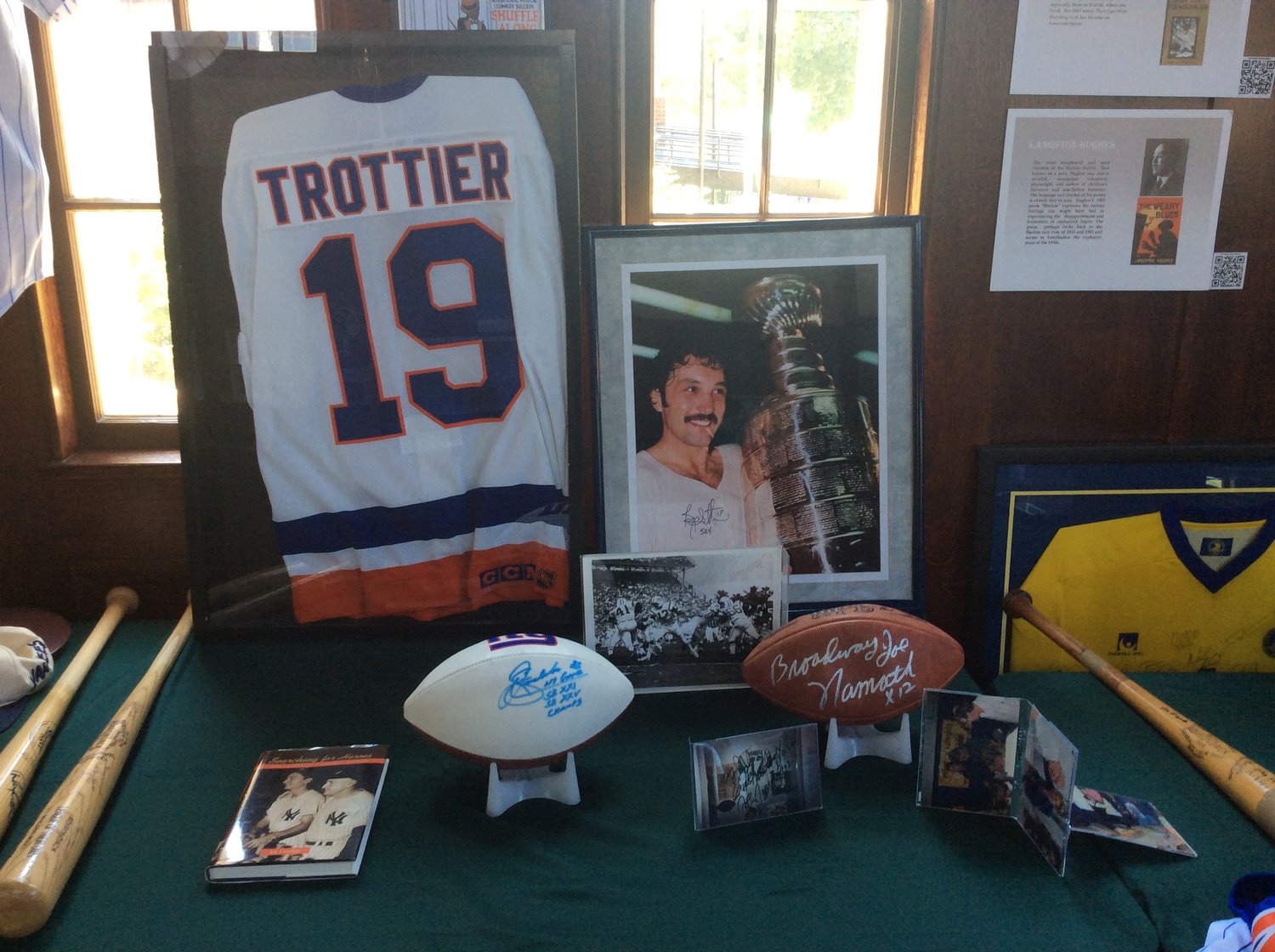 The museum featured a sports memorabilia lecture, showcasing autographs from famed athletes.
