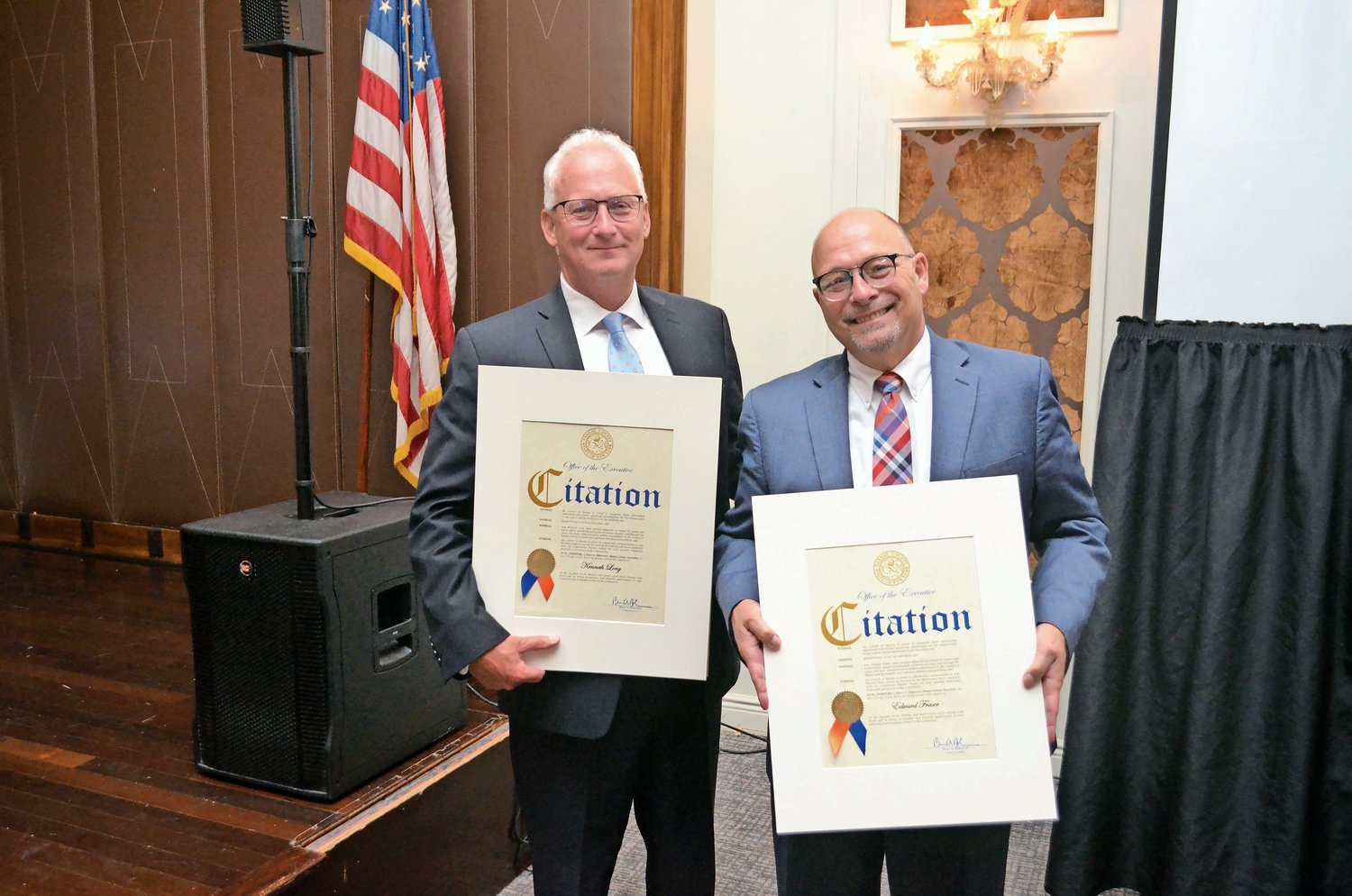 Kenneth Long, left, and Edward Fraser, the Community Partner Award winners, showed off their Nassau County citations.