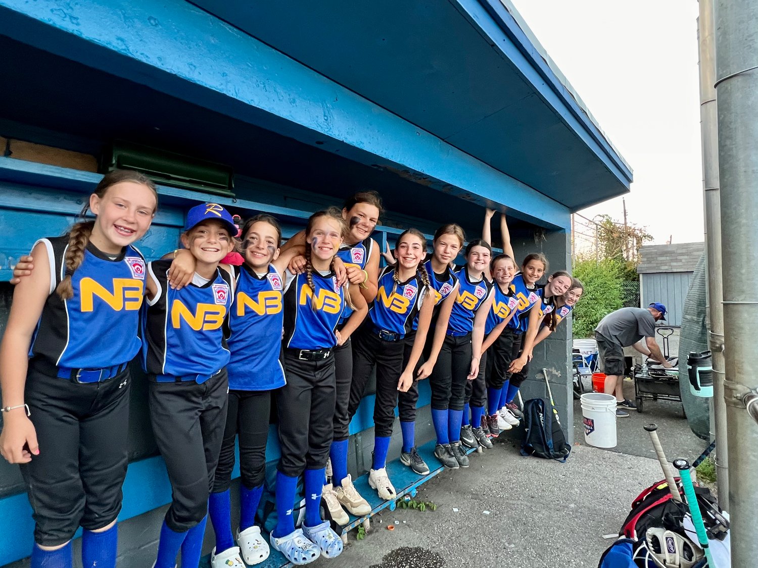Ready to play ball, the girls were lined up in the dugout. The North Bellmore North Merrick Little League 10-and-under Lady Rebels made it to the New York State Little League Championship Tournament.