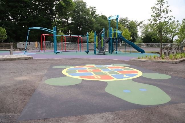 With major renovations at Elmont Road Park completed, such as the children’s playground area shown here, residents are eager to host events at the park during the remainder of the summer.