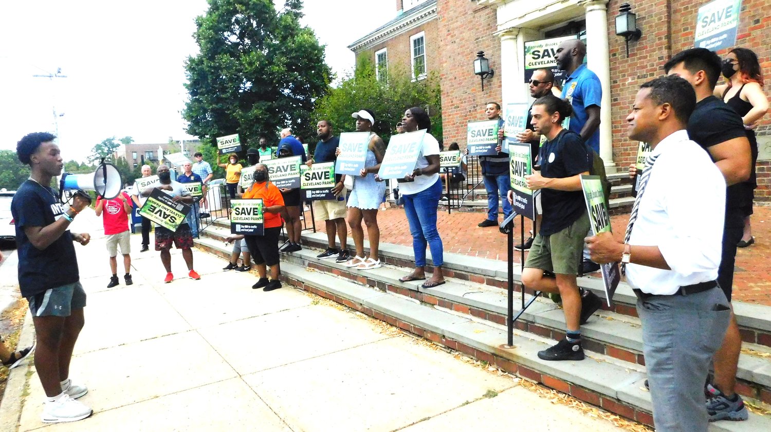 Reine Bethany/Herald
Freeport schools alumnus Myles Hollingsworth spoke in favor of preserving the Cleveland Avenue athletic field at a rally on Monday night on the steps of the municipal building.