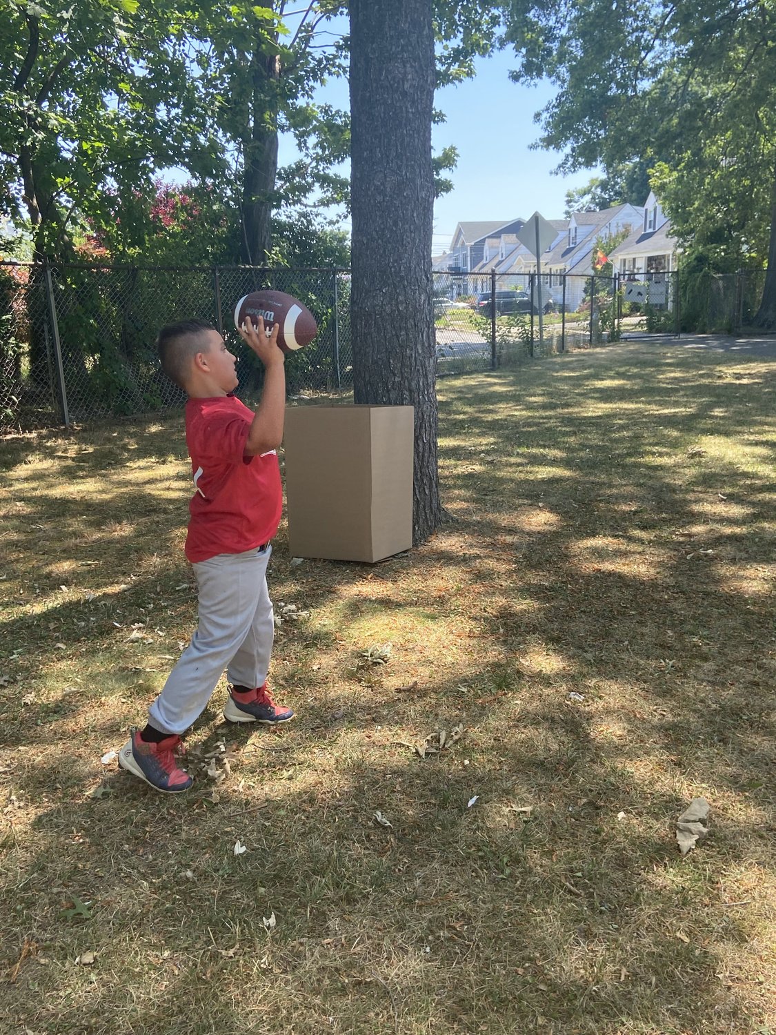 Christian Krug enjoyed a game of football after winning his little league game.