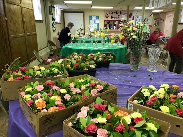 The Merrick Garden Club creates floral arrangements twice a year, and donates them to Meals on Wheels, which delivers food to people who cannot purchase or prepare their own meals.