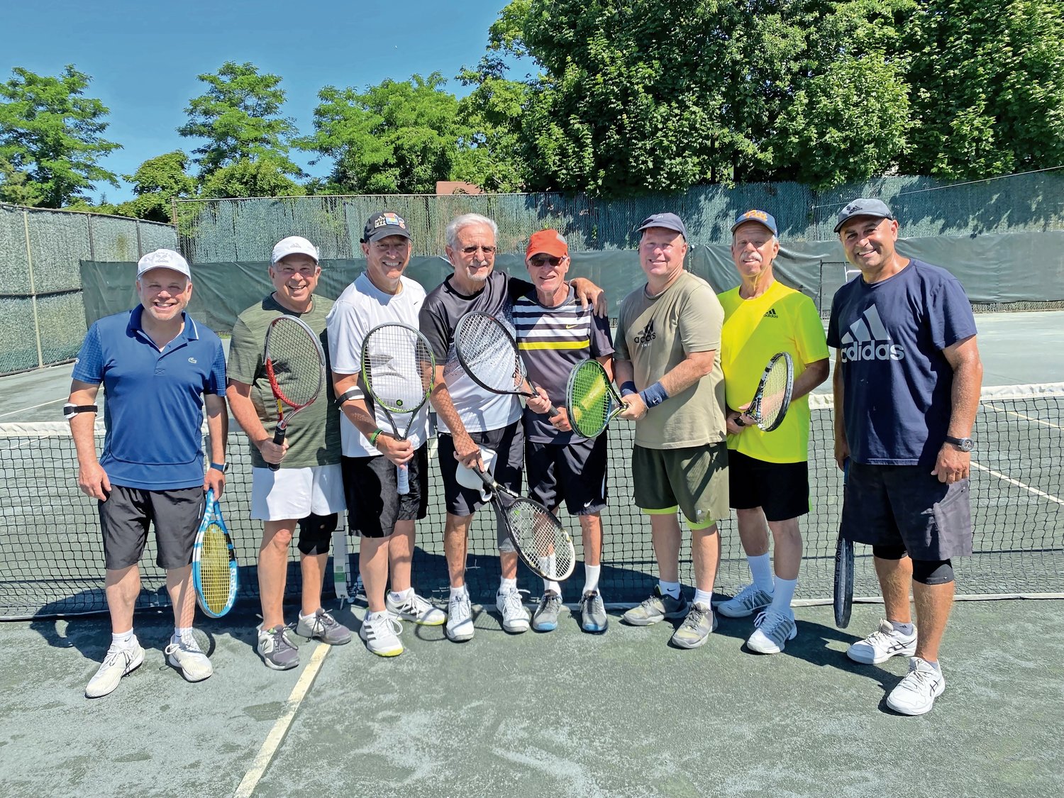 The July 4 men’s tennis competition at the Lawrence Yacht & Country Club included runners up Gary Goffner, far right, Marty Friedman, Ken Frost and Anthony Genovese, then the winners Henry Blummer. Dennis Miller, David Betron and Rafael Zabihi.