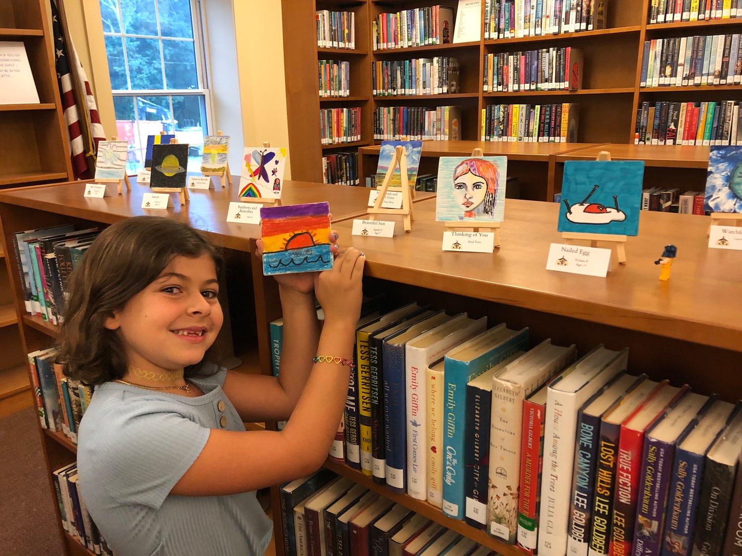 Agatha Pileggi, 12, created a Bayville sunset, which is on display at the Bayville Library in the Tiny Art Show.