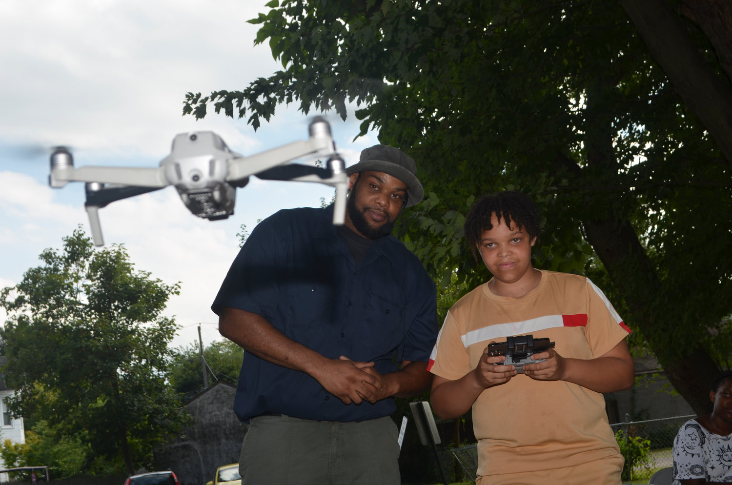 Antoine McLean teaches kids in the program — including his son, Antoine Jr. — how to handle and operate drones safely.