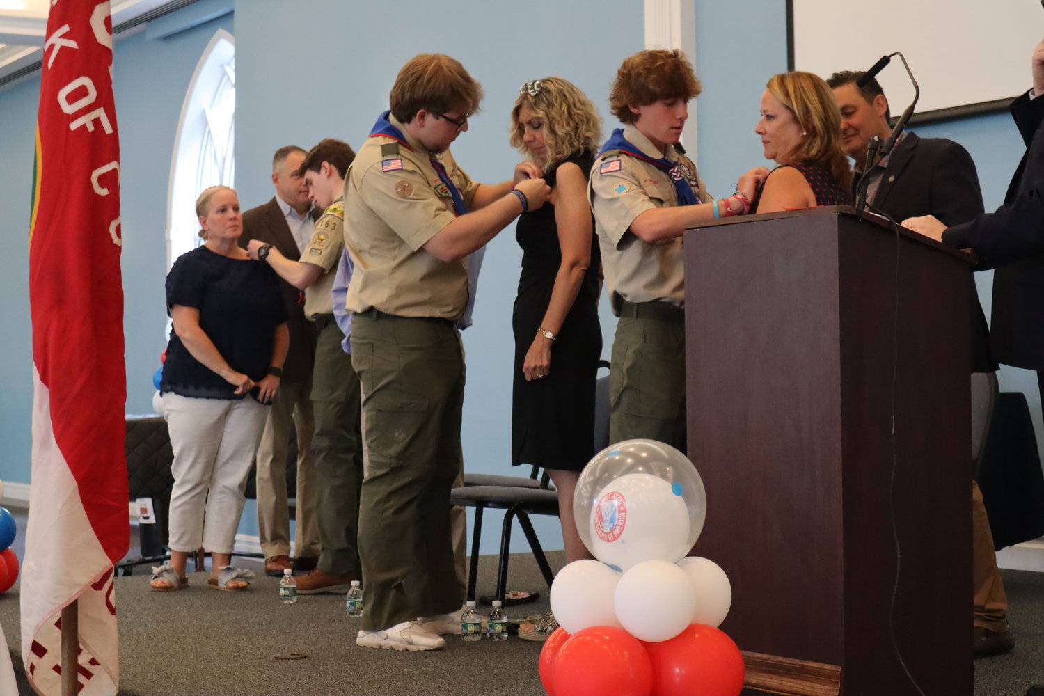 Eagle Scouts presented their parents with mentor pins for helping support and guide them.