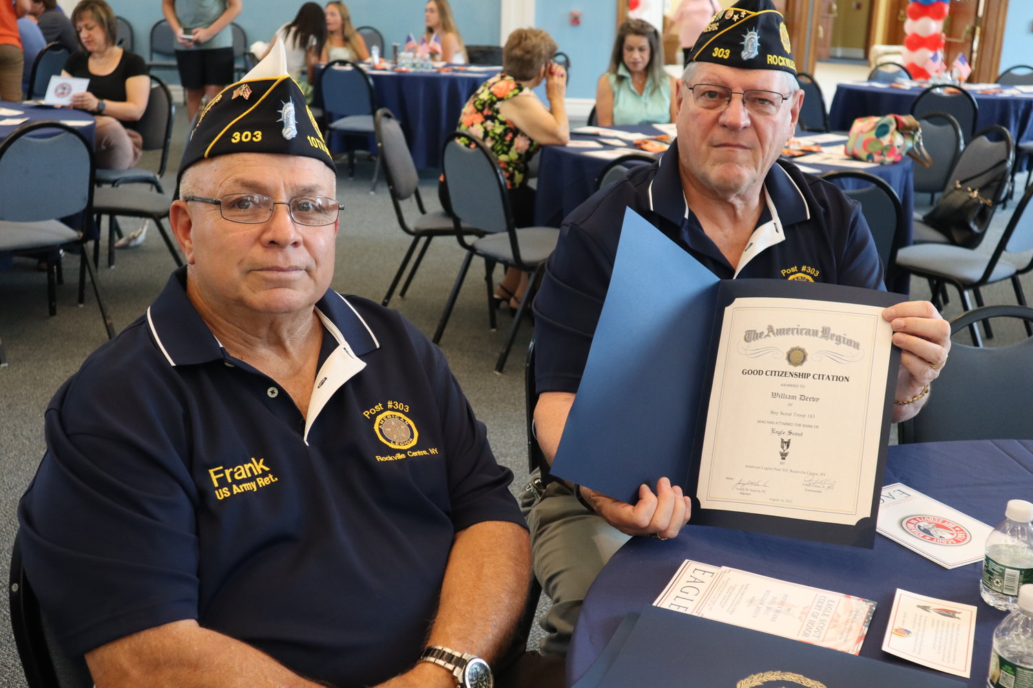 American Legion District Commander Frank Colon and Joseph M. Scarola presented the Eagle Scouts with the Good Citizenship Citation, on behalf of Post 303 in Rockville Centre.