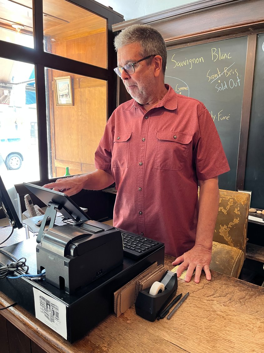 Businesses like the Village Wine Merchant are used to seeing less business in the summer, as families take a vacation from the hustle and bustle of Long Island.