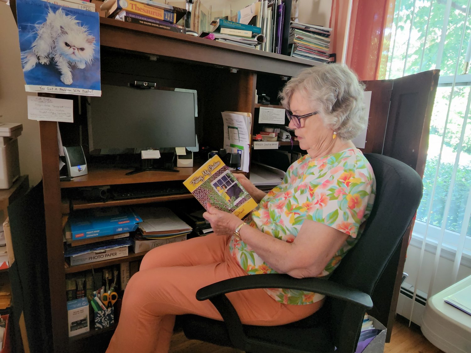 The former poet laureate often writes her poetry at her desk. Reading “Facing My Shadow,” a collection of her poems gives her inspiration to write other poems.