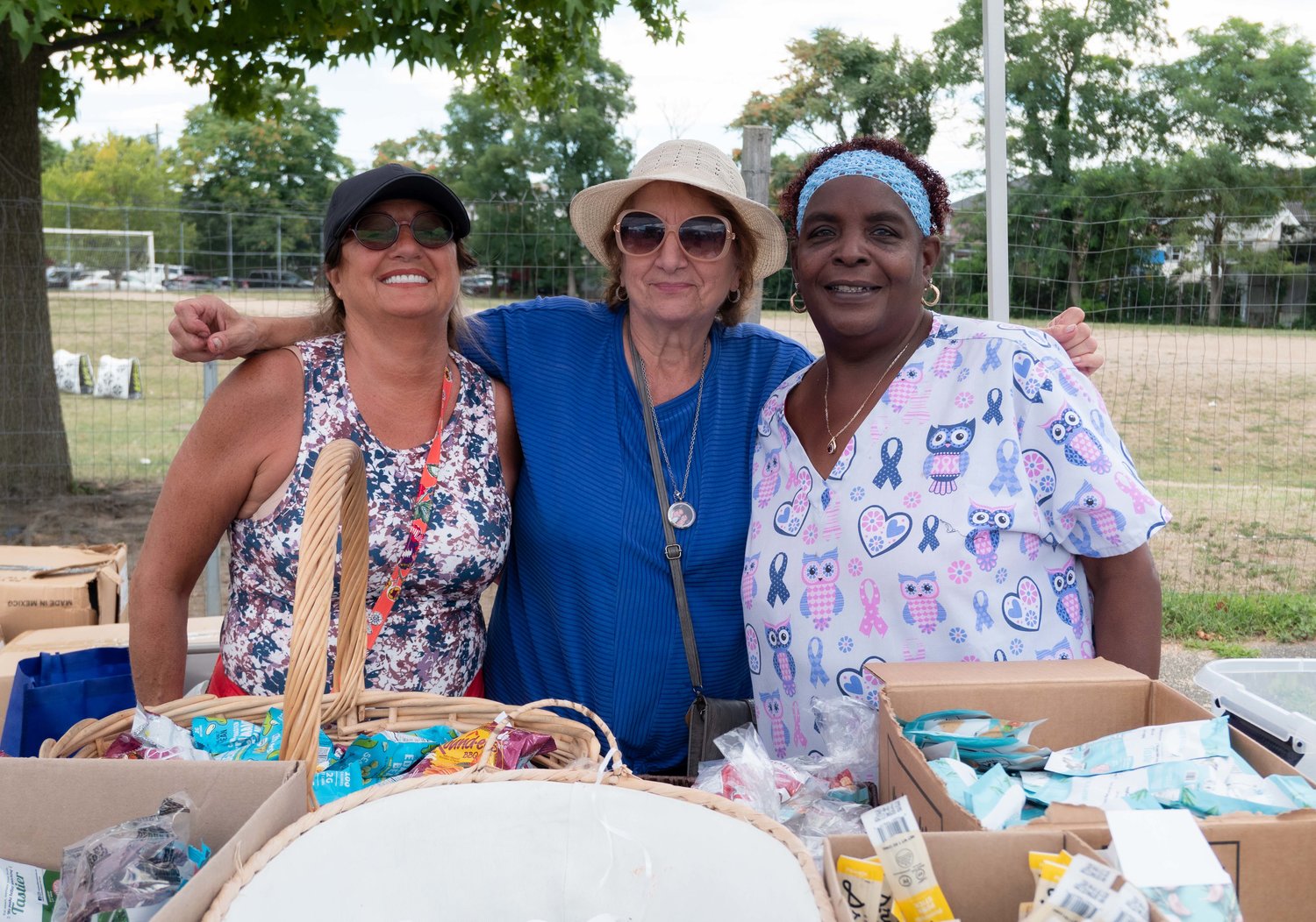 Rita Corso, left, Maria Artusa and Diane Tyler manned one of several booths at Inwood Day.