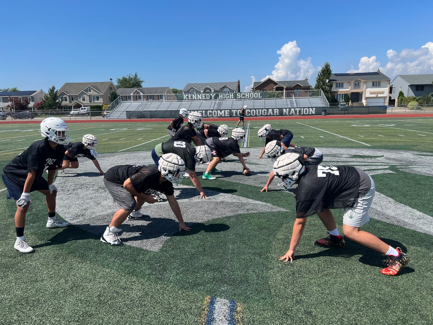 As this season’s football camp kicked off last week for the Bellmore-Merrick Central High School District’s three varsity football teams, some players donned a new, protective padding on their helmets, called guardian caps.