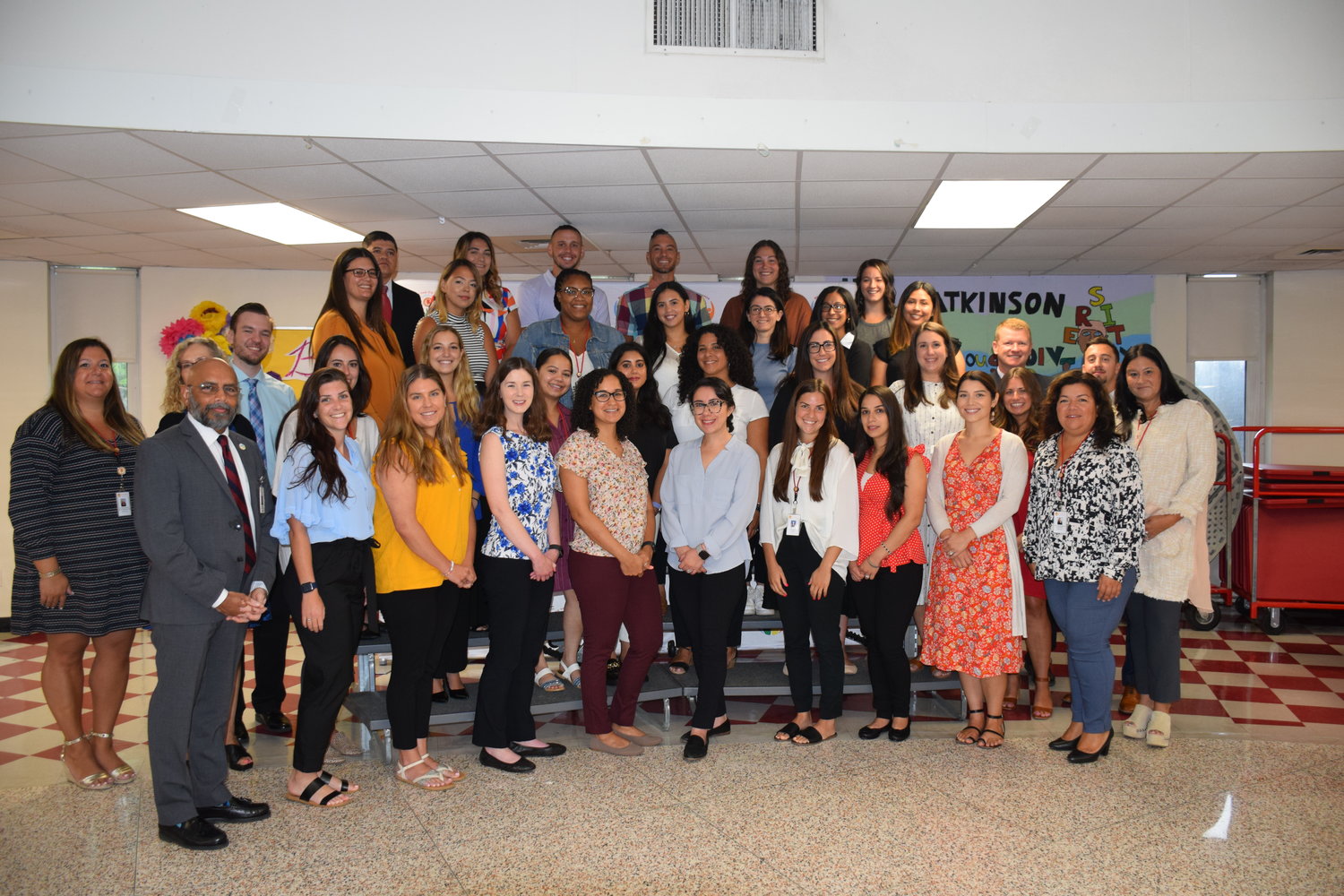 Freeport Public Schools Superintendent of Schools, Dr. Kishore Kuncham (front row left), Board of Education President, Maria Jordan-Awalom (front row second right) and administrators welcomed new educators to the district at new teacher orientation on August 31